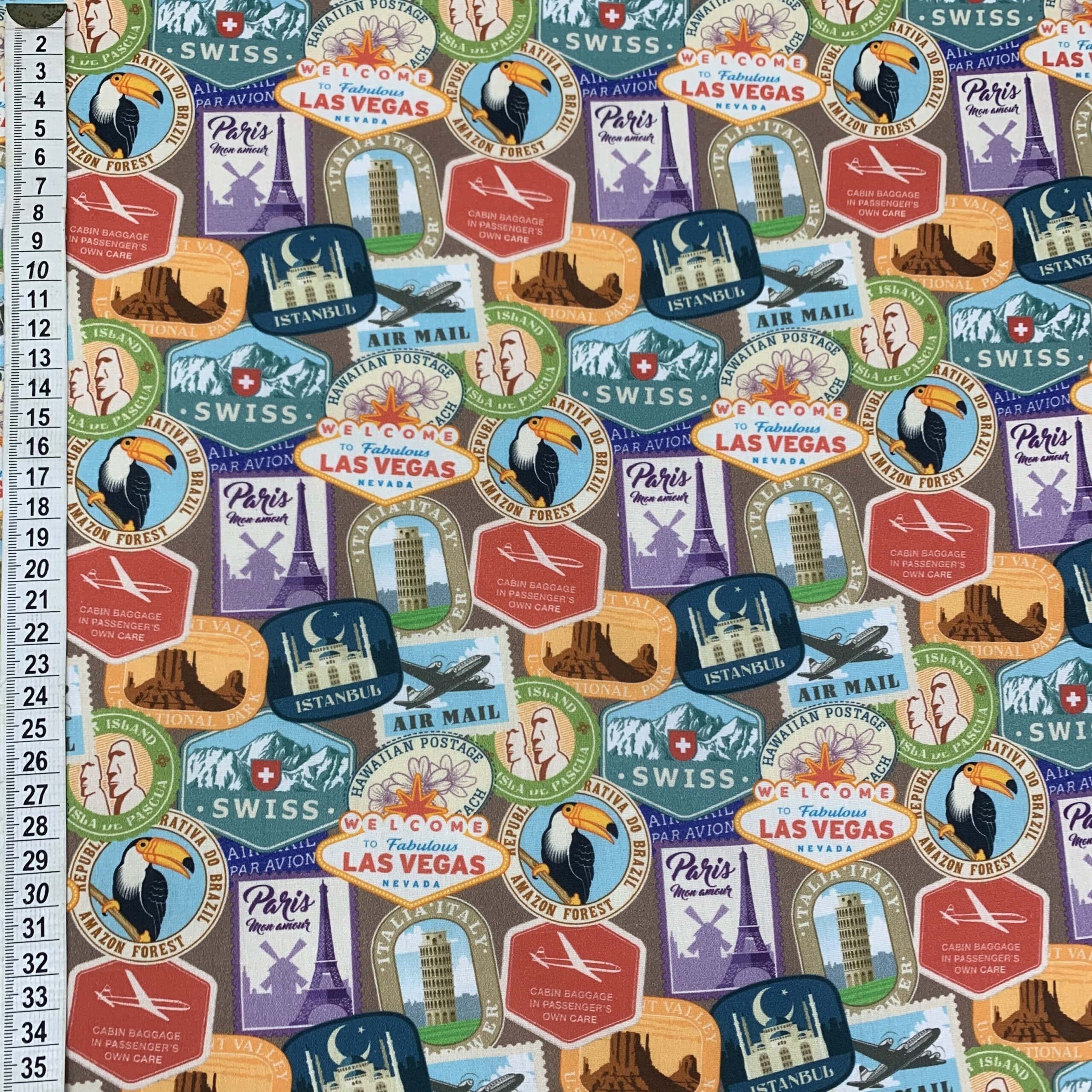 Tecido nacional tema viagens selos