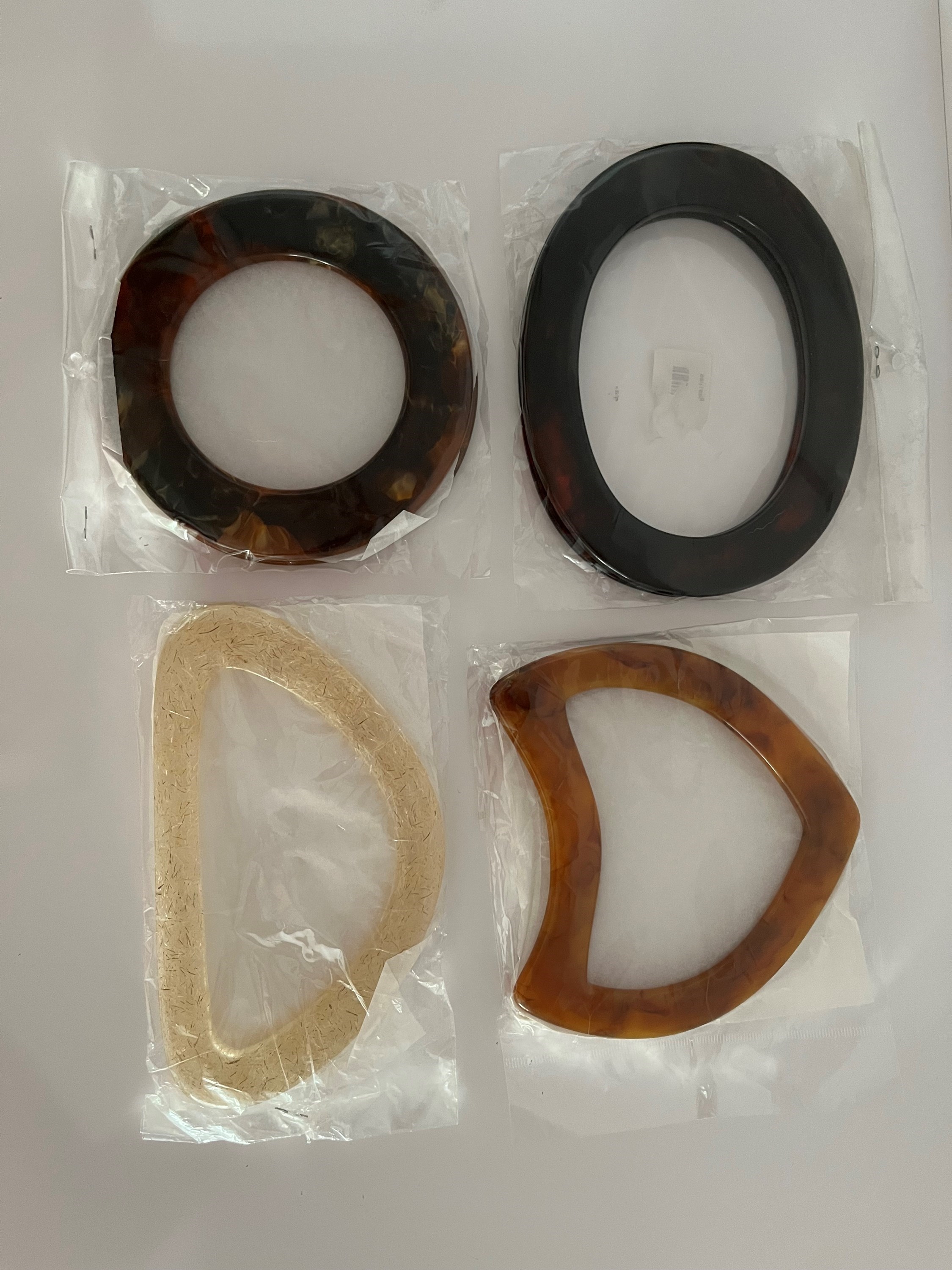 Conjunto de alças em resina, diferentes formatos e cores