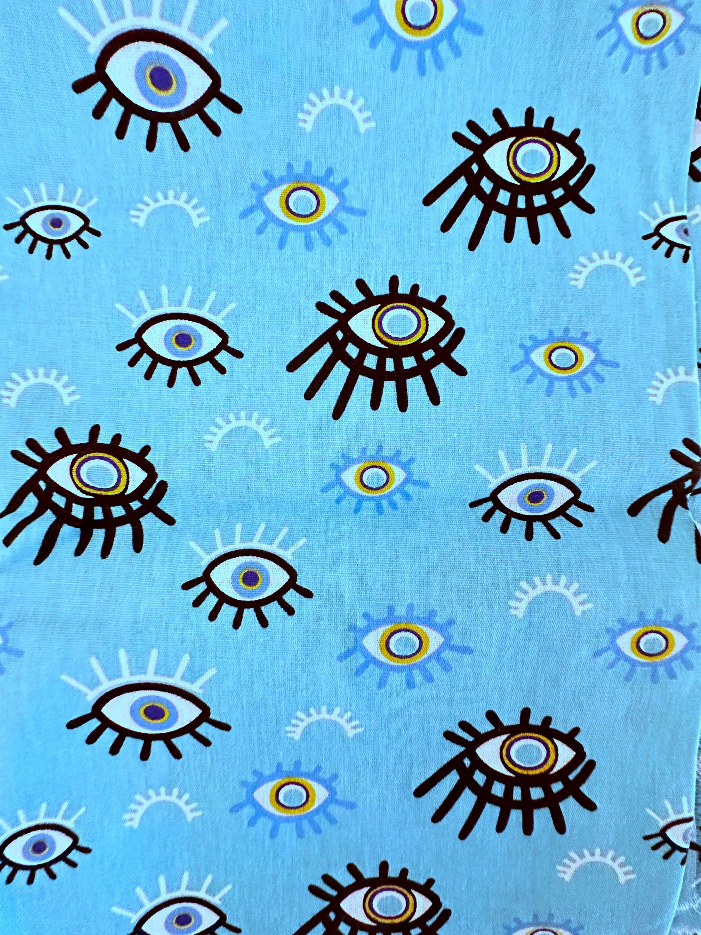 Tecido nacional olho grego